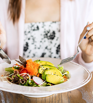 Woman eating a salad