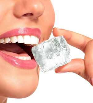 Woman biting into an ice cube
