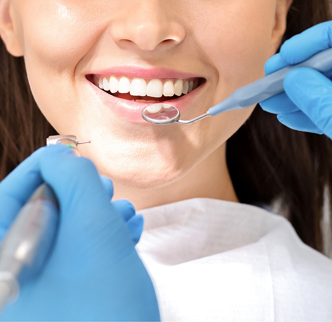 Woman smiling during a dental checkup
