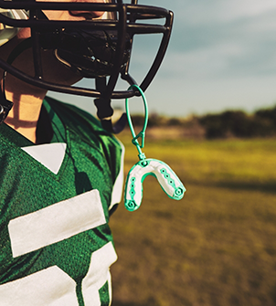 Football player with a mouthguard