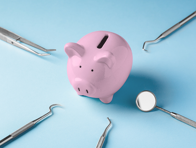 Piggy bank with several dental instruments