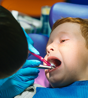 Child getting a dental exam