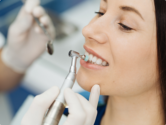 Woman getting a professional teeth cleaning