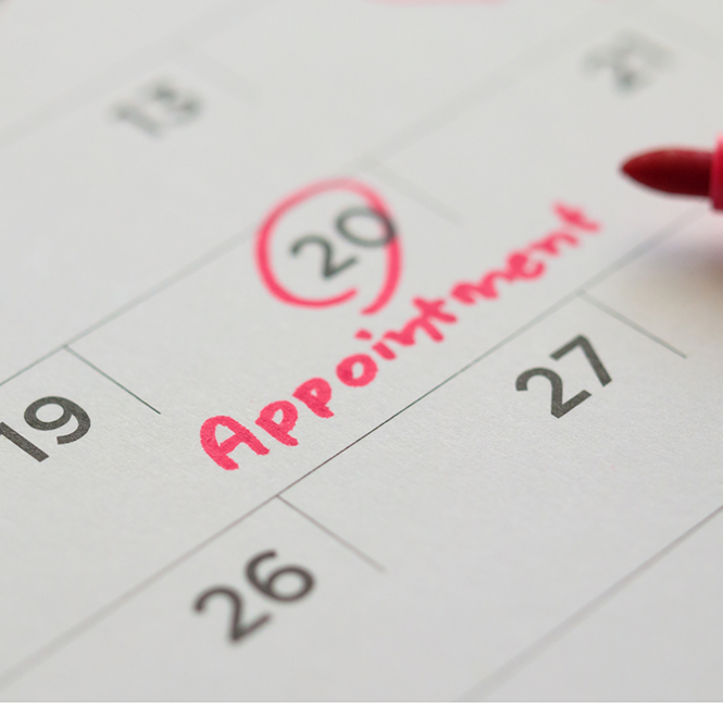 Date of a dental appointment circled on a calendar