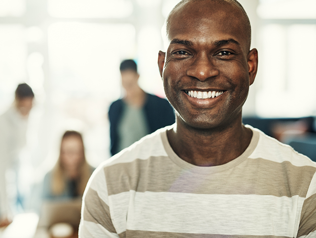 Man smiling indoors